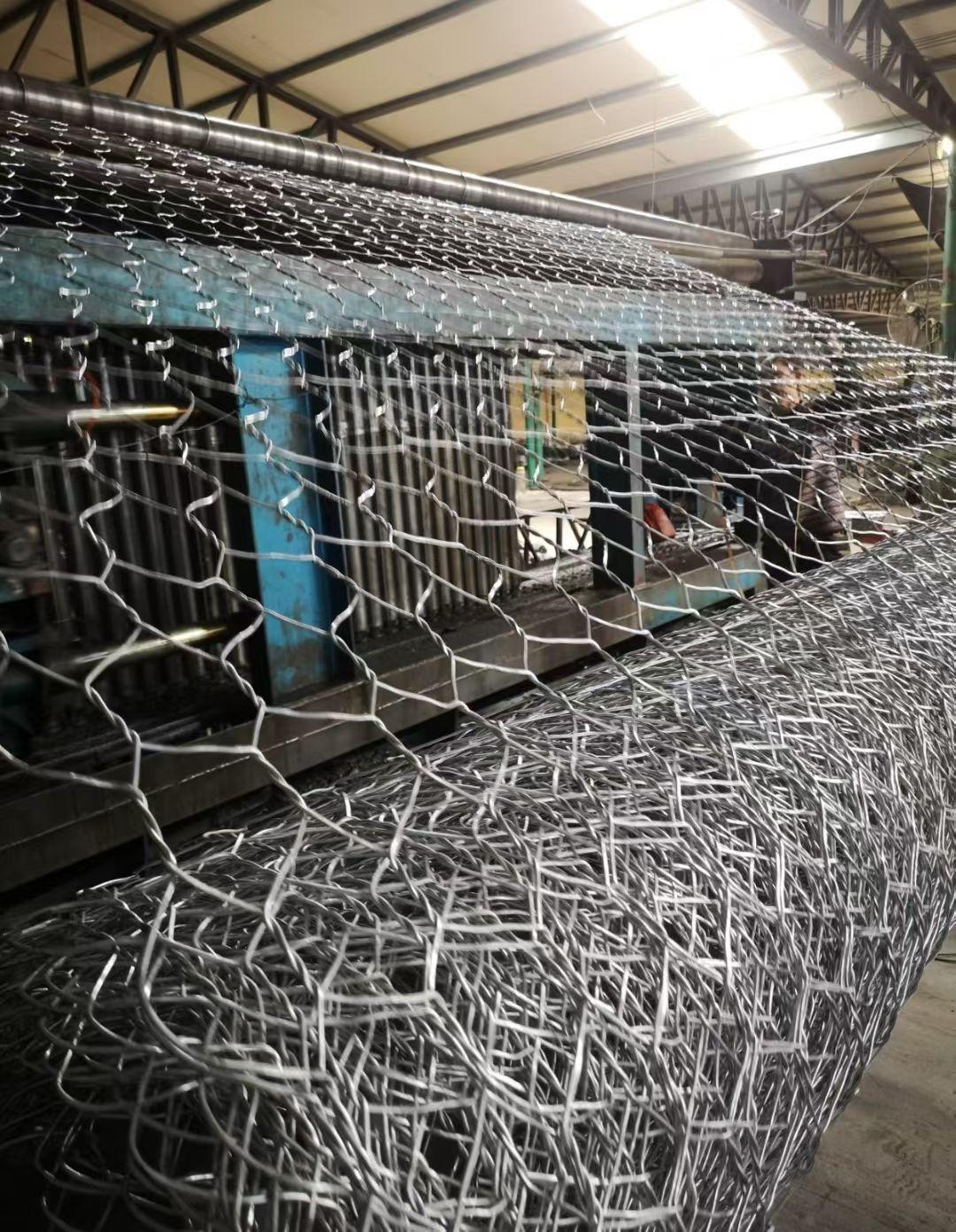Gabion baskets being assembled and positioned on prepared foundation